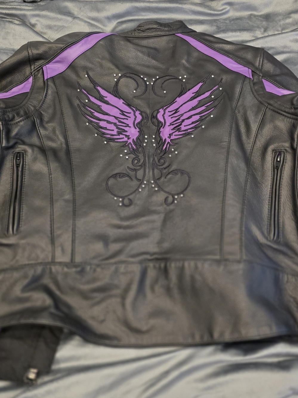 Women’s Black Leather Jacket with Purple Wing Accent